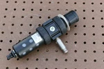 Parker 05E12A13AB 1/4" Filter Regulator. Fixed Price $50.00.
