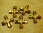 Lot Of 5 Fittings 1/4 Inch Union Cross, Brass, Swagelok B-400-4. Fixed Price $35.00.