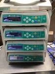 4 X Braun Infusomat Space Pumps 8713051U W/ Docking Station -. Fixed Price $1000.00.