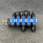 Yuken L-DSG-01-2D2-D24-70 Directional Valve MDC-01-A-30 Hydraulic Manifold. Fixed Price $749.99.